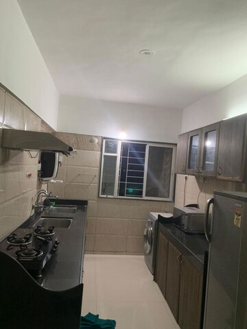 Kitchen in 2 BHK Apartment at GK Rose Woods, Pimple Saudagar – for Rent