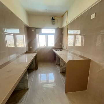 Kitchen in 2 BHK Apartment at Amisha Borivali Padam CHS, Chinchpada – for Sale
