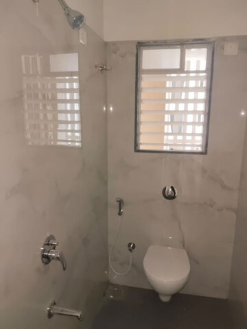Bathroom in 1 BHK Apartment at Raunak Delight, Owale – for Rent