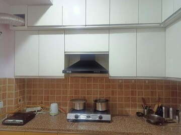 Kitchen in 2.5 BHK Apartment at Mahagun Mywoods, Sector 16c Greater Noida – for Rent