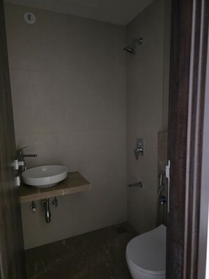 Bathroom in 3 BHK Apartment at Shapoorji Pallonji The Designate, Khar West – for Rent
