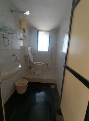 Bathroom in 2 BHK Apartment at Atul Blue Horizon II, Malad West – for Sale