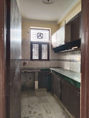 Kitchen in 2 BHK Apartment at Ashoka Enclave 3, Sector 35 – for Sale