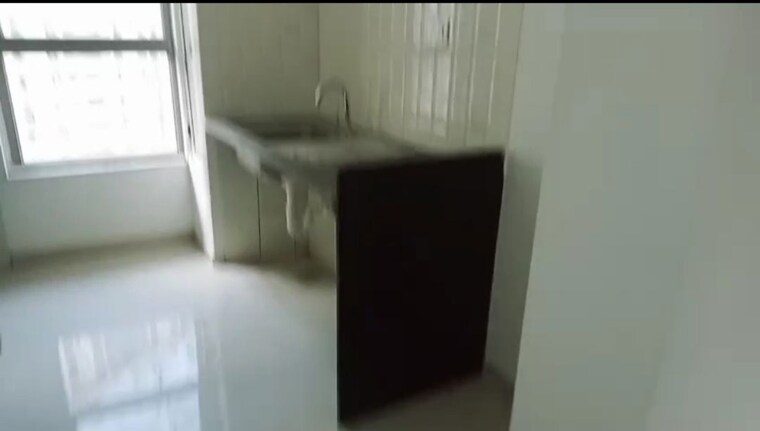 Kitchen, kalpataru-immensa-h 1 Bedroom 430 Sq.Ft. Apartment In Kolshet Road Thane 9753731