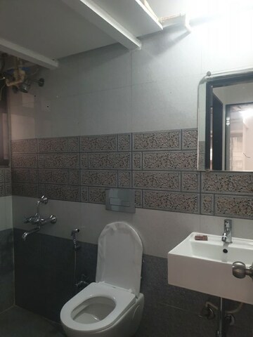 Bathroom in 1 BHK Apartment at Apna Ghar CHS, Malad East – for Rent