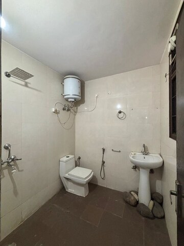 Bathroom in 2 BHK Apartment at Palm Residency Chhatarpur, Chattarpur – for Rent