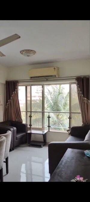 Living Room in 2 BHK Apartment at Vile Parle East – for Rent