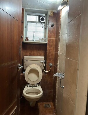Bathroom in 2 BHK Apartment at Dadar West – for Rent