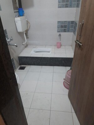 Bathroom in 2 BHK Apartment at Nirman Nisarga, Bhusari Colony – for Rent