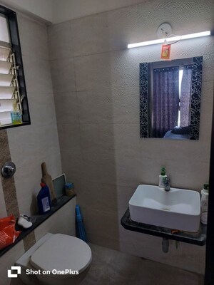 Bathroom in 2 BHK Apartment at Mittal Sun Exotica, Yewalewadi – for Rent