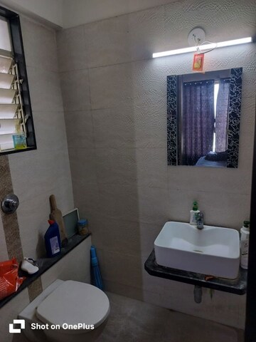 Bathroom in 2 BHK Apartment at Mittal Sun Exotica, Yewalewadi – for Rent