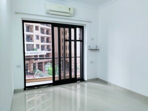 Room in 2 BHK Apartment at K Raheja Raheja Residency, Malad East – for Rent