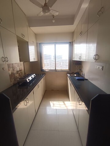 Kitchen in 1 BHK Apartment at Agarwal Trinity Towers, Malad West – for Rent