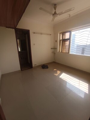 Bedroom in 1 BHK Apartment at Agarwal Trinity Towers, Malad West – for Rent