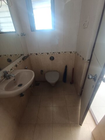 Bathroom in 1 BHK Apartment at Agarwal Trinity Towers, Malad West – for Rent