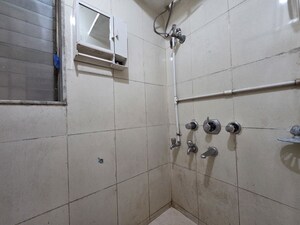 Bathroom in 1 BHK Apartment at Radhika CHS Goregaon, Goregaon East – for Rent