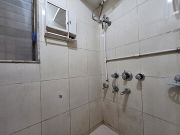 Bathroom in 1 BHK Apartment at Radhika CHS Goregaon, Goregaon East – for Rent