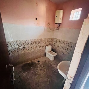 Bathroom in  Co-working Space at RWA Apartments Sector 121, Garhi Chaukhandi – for Rent