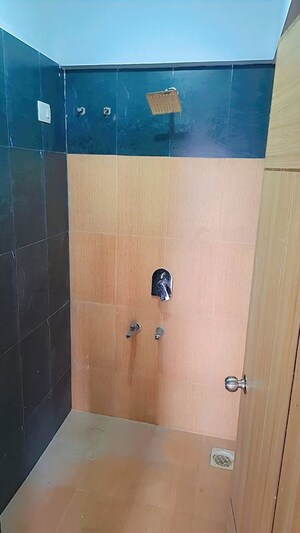 Bathroom in 2 BHK Apartment at Dynamic Crest, Shilphata – for Sale