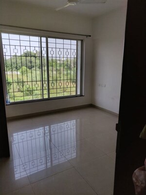 Room in 2 BHK Apartment at Gera Emerald City, Kharadi – for Rent