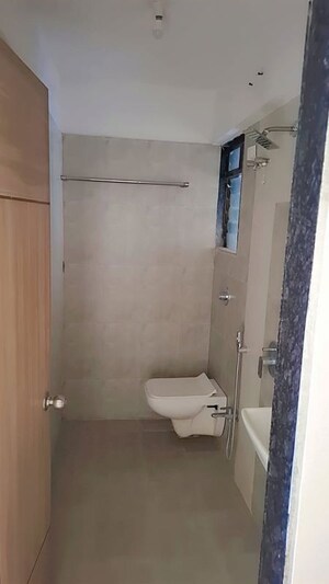 Bathroom in 2 BHK Apartment at Dynamic Crest, Shilphata – for Sale