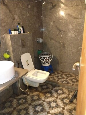 Bathroom in 3 BHK Apartment at Eros Mayfair Towers, Charmwood Village – for Sale