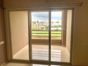 Room in 2 BHK Apartment at Rhythm Society, Wakad – for Rent