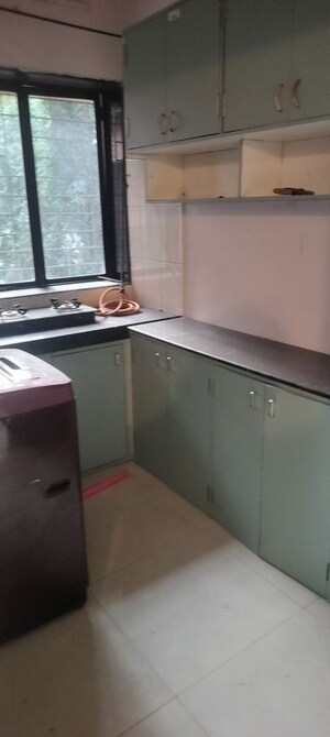 Kitchen in 1 BHK Apartment at Montana CHS, Andheri West – for Rent