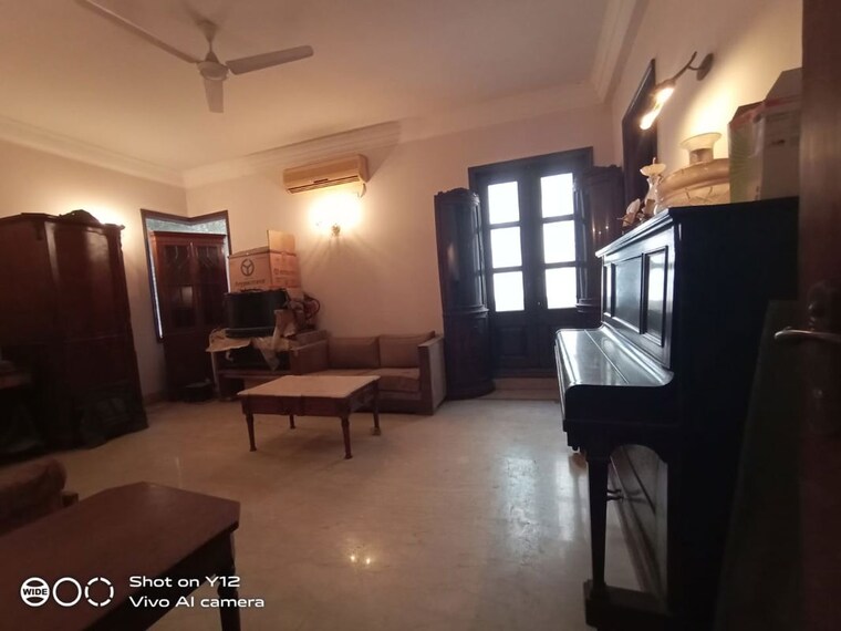 Living Room, panchsheel park 4 Bedroom 800 Sq.Yd. Builder Floor In Panchsheel Park Delhi 9756709