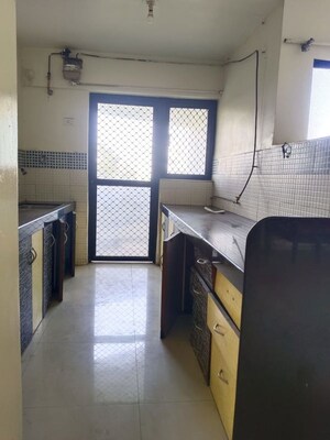 Kitchen in 3 BHK Apartment at Rutuparna Apartments, Baner – for Rent