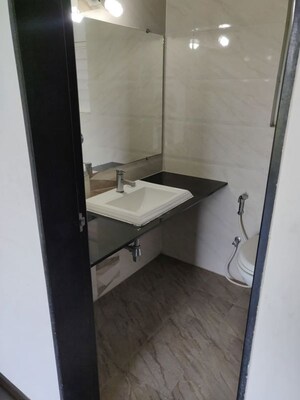 Bathroom in 2 BHK Apartment at Kolte Patil Langston, Kharadi – for Rent