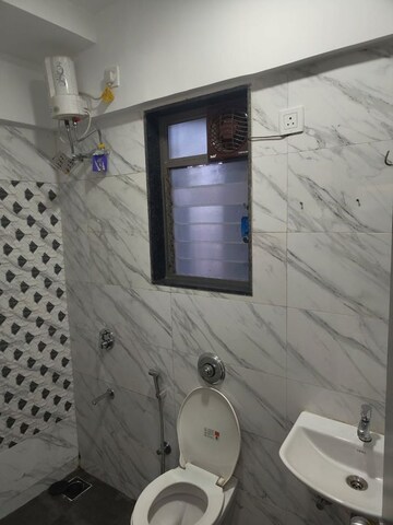 Attached Bathroom in 1 BHK Apartment at UK Iridium, Kandivali East – for Rent