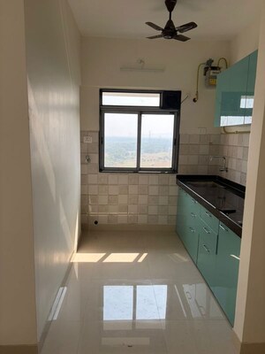 Kitchen in 1 BHK Apartment at Haware Amara, Vikhroli East – for Rent