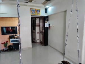 Living Room in 1 BHK Apartment at Krishna Niwas Kandivali West, Kandivali West – for Sale