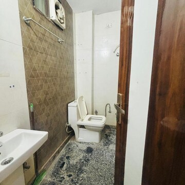 Bathroom in 2 BHK Builder Floor at Dwarka Mor – for Rent