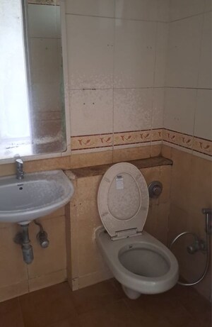 Bathroom in 2 BHK Apartment at Eden Woods complex, Manpada – for Rent