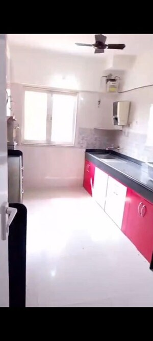 Kitchen in 2 BHK Apartment at Eden Woods complex, Manpada – for Rent