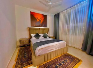 Bedroom in 3 BHK Apartment at Omaxe The Palace, Sushant Golf City – for Rent