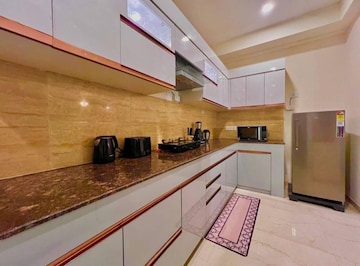 Kitchen in 3 BHK Apartment at Omaxe The Palace, Sushant Golf City – for Rent