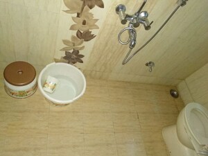 Bathroom in 2 BHK Apartment at Indraprasth CHS, Anand Nagar – for Rent