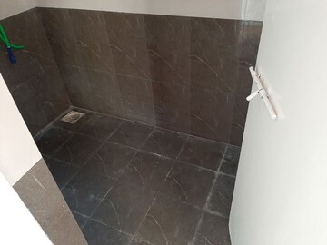 Bathroom in 1 BHK Apartment at Indraprasth CHS, Anand Nagar – for Rent