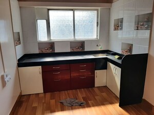 Kitchen in 1 BHK Apartment at Indraprasth CHS, Anand Nagar – for Rent