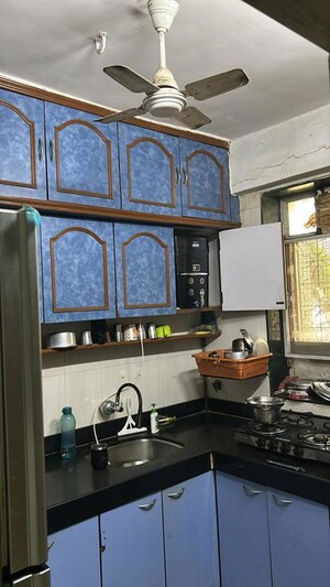 Living Room in 2 BHK Apartment at Everard CHS, Sion – for Sale