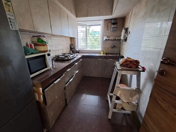 Kitchen in 3 BHK Apartment at Sarkar Avenue Apartment, Santacruz West – for Sale