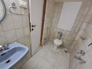 Bathroom in 3 BHK Apartment at Sarkar Avenue Apartment, Santacruz West – for Sale