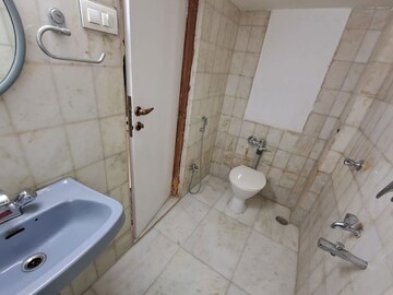 Bathroom in 3 BHK Apartment at Sarkar Avenue Apartment, Santacruz West – for Sale