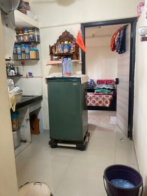 Kitchen in 1 BHK Apartment at Shanti Gardens , Mira Road – for Sale
