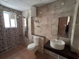 Bathroom in 3 BHK Apartment at Maya Garden City, Lohgarh – for Rent