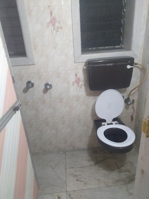 Bathroom in 2 BHK Apartment at Golden Rock CHS, Santacruz East – for Rent