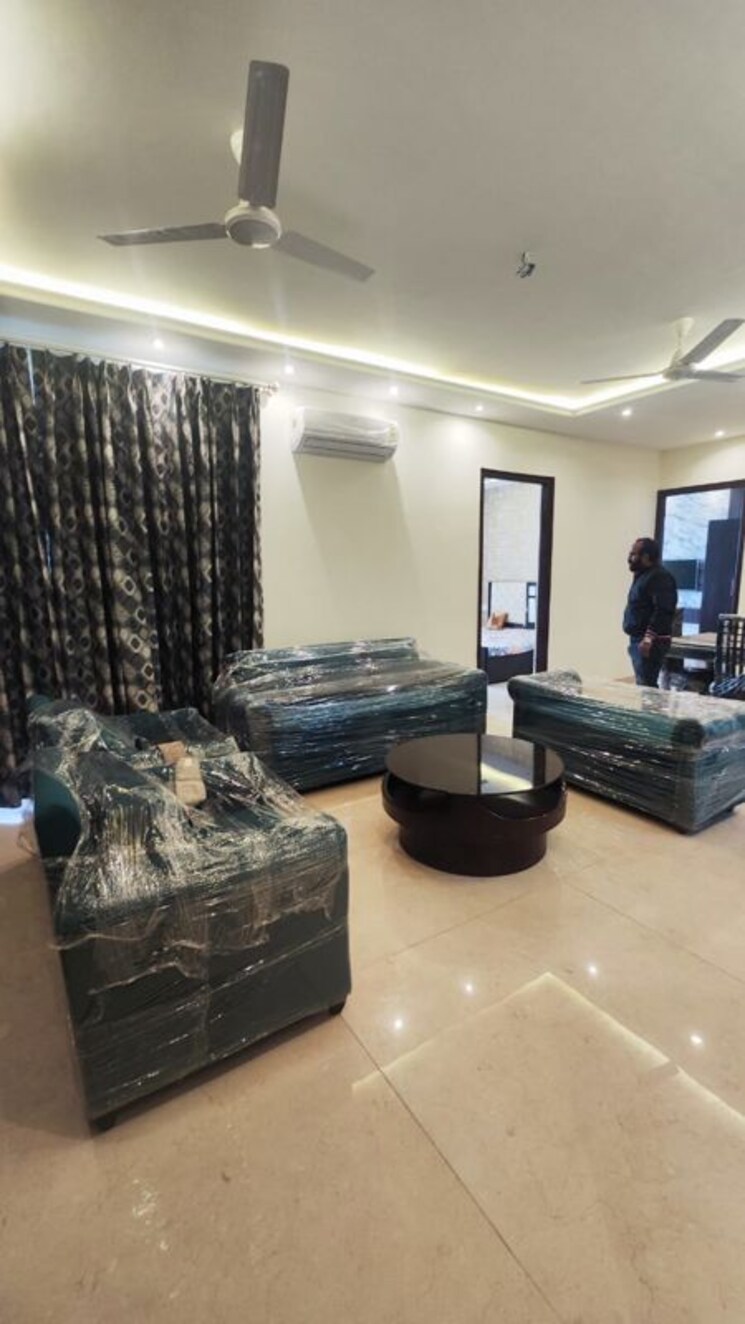 Living Room, maya-green-lotus-saksham 3 Bedroom 1346 Sq.Ft. Apartment In International Airport Road Zirakpur 9400537